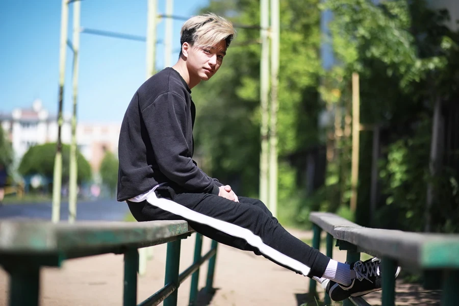 Man wearing striped sweatpants
