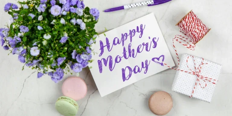 Mother’s Day card next to flowers and macarons