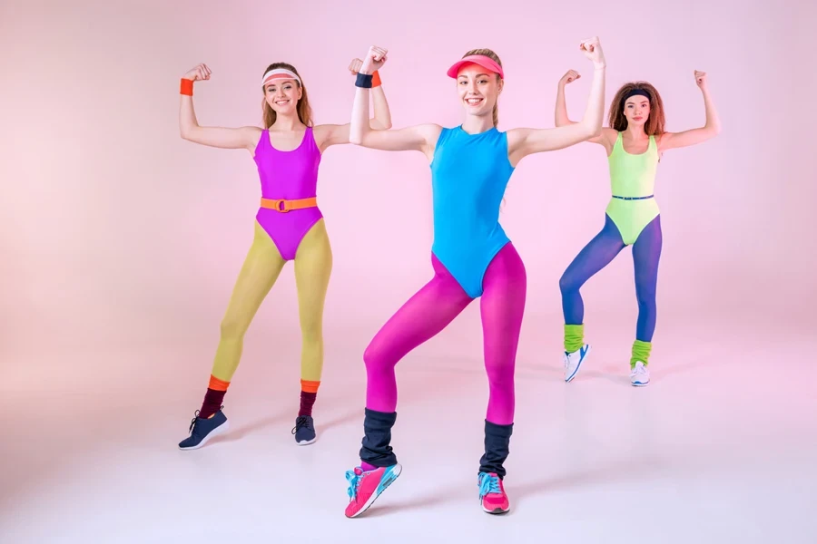 Three women in neon colored clothings