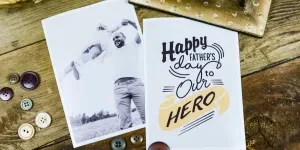 Two cards on brown wooden surface