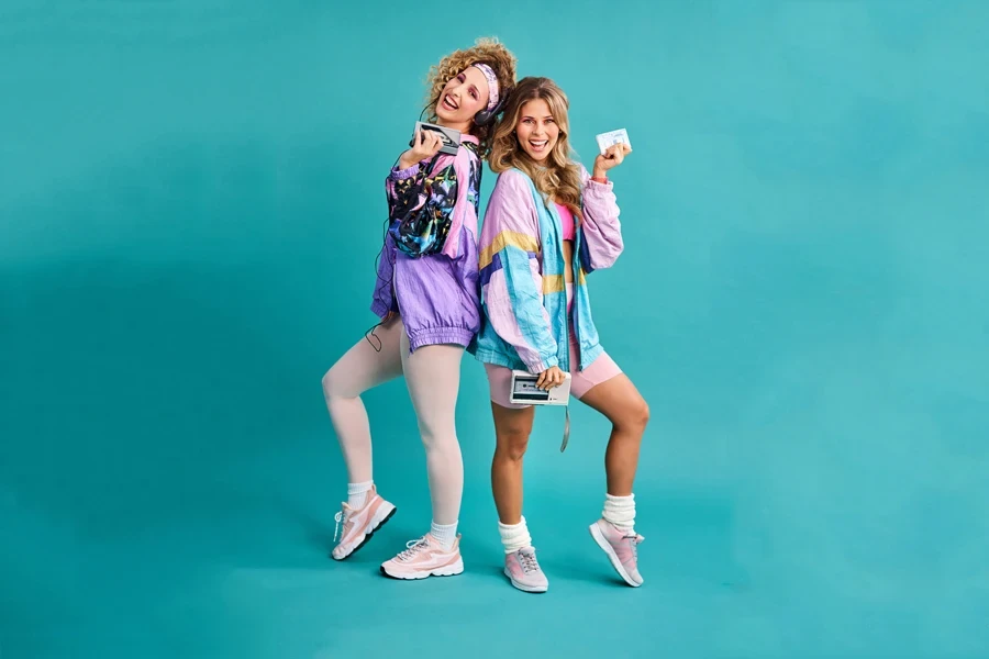 Two women in 80s fashion