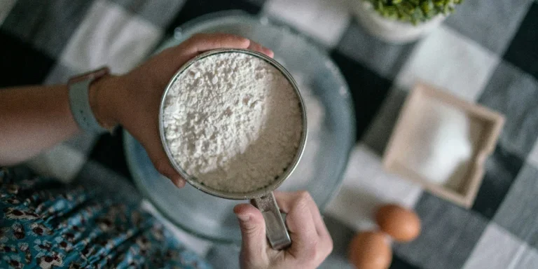 Woman holding a flour sifter