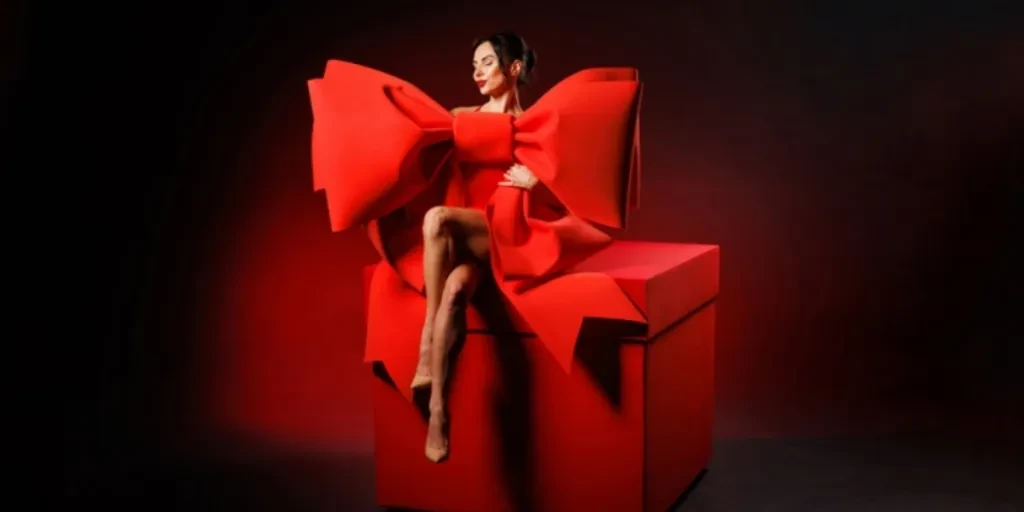 Woman in red dress with big bow