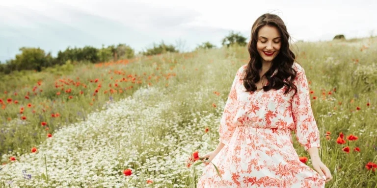 Woman wearing a colorful floral pastel dress
