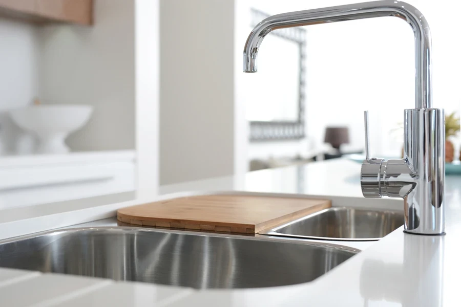 Wooden kitchen sink cover creating more countertop space