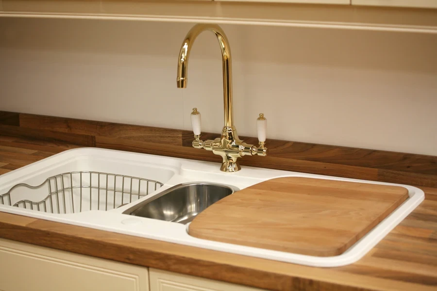 Workstation sink with sink grids and bamboo cover