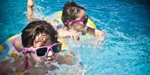2 Girls’ Swimming during Daytime