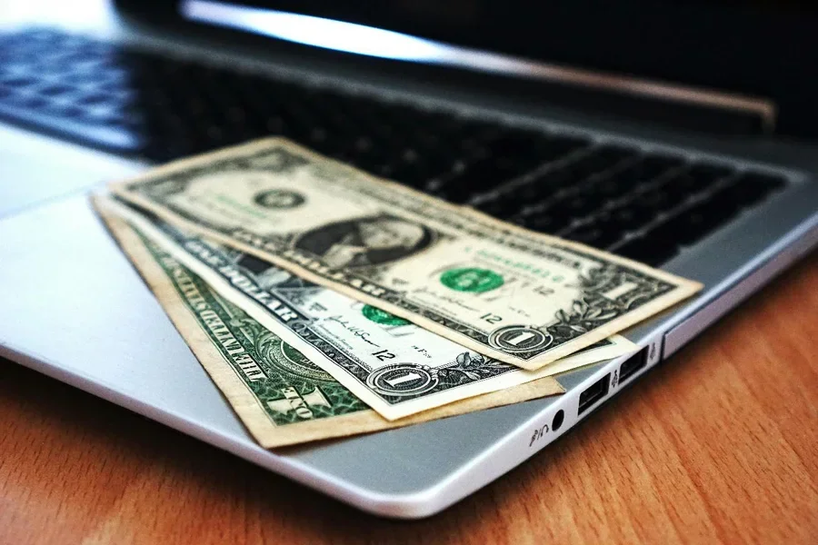 A close-up of money on a computer