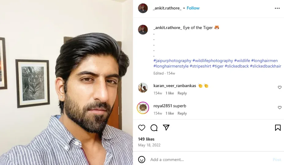 A screenshot of a man rocking a slicked-back straight cut