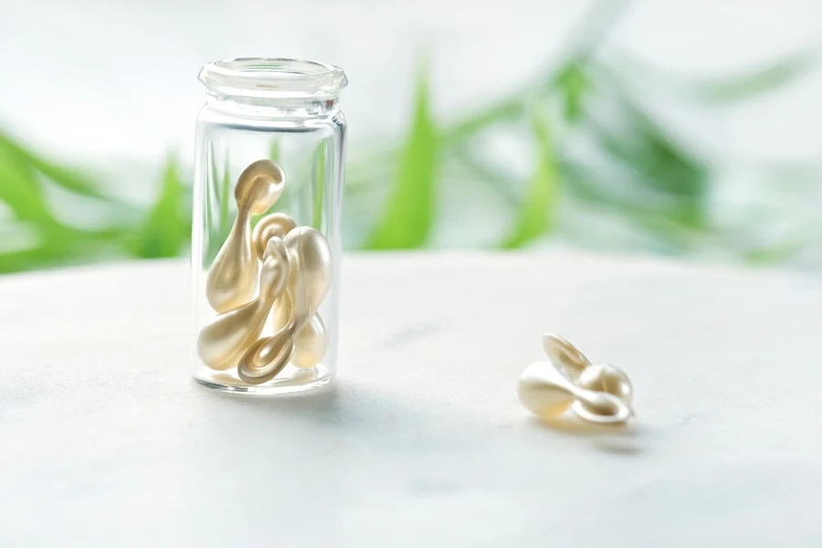 Beauty capsules in a transparent bottle