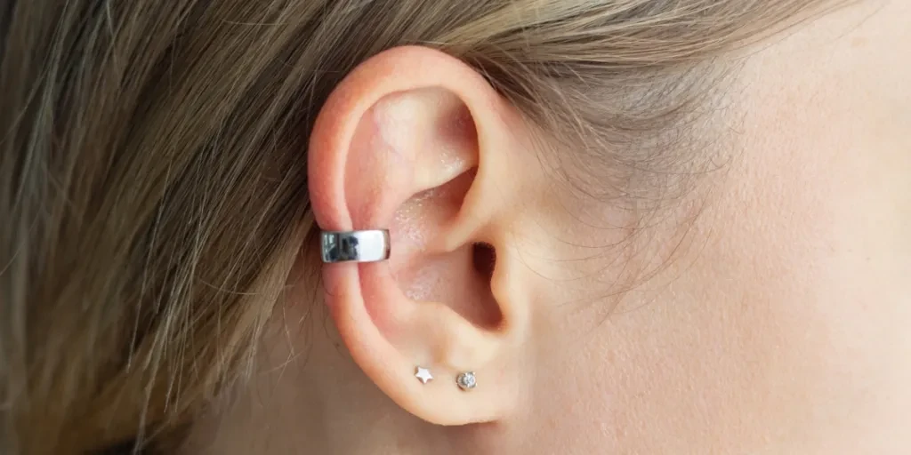 Cropped ear cuff on ear