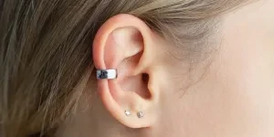 Cropped ear cuff on ear