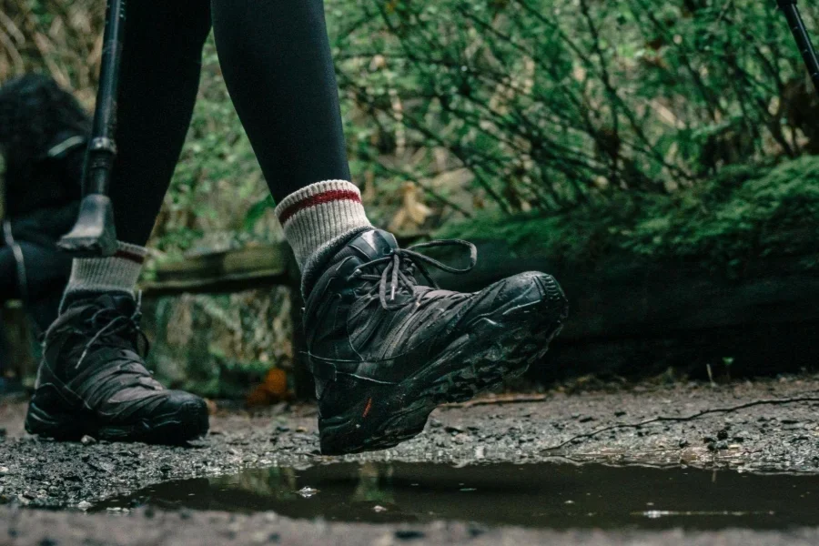 Low-Angle Shot of a Person Wearing Hiking Shoes