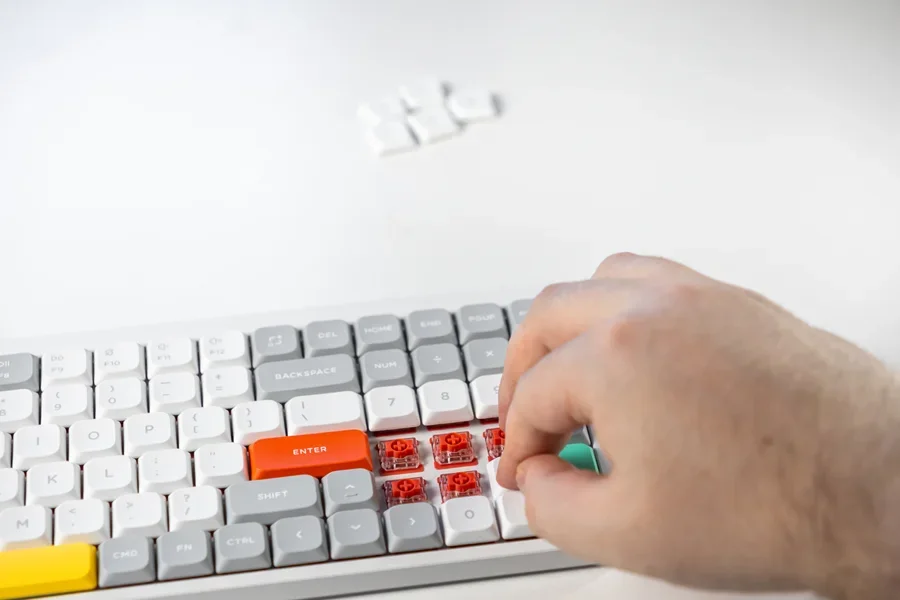 Man building a hot-swappable keyboard