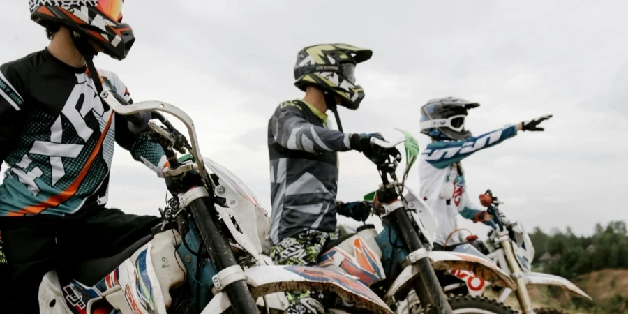 Men Riding Dirt Motor Bikes Together