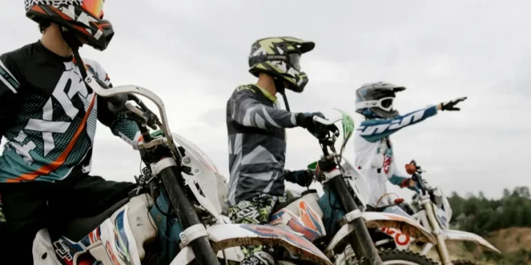 Men Riding Dirt Motor Bikes Together
