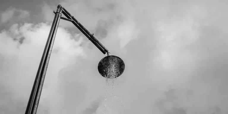 Water splash on a stainless steel rain shower head