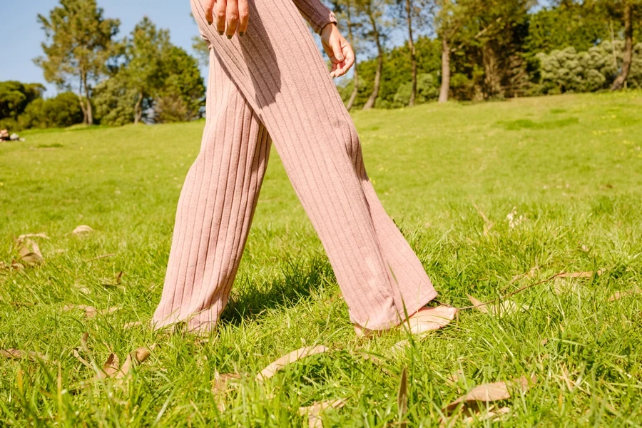Woman enjoying a walk in pink waffle palazzo pants