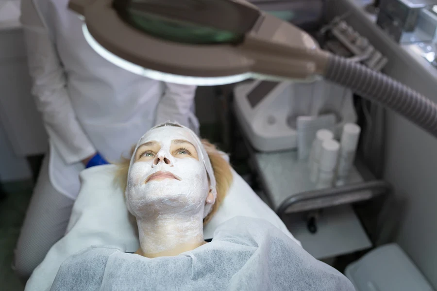 Woman getting a skincare treatment at a salon