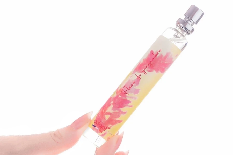 Woman holding a floral fragrance