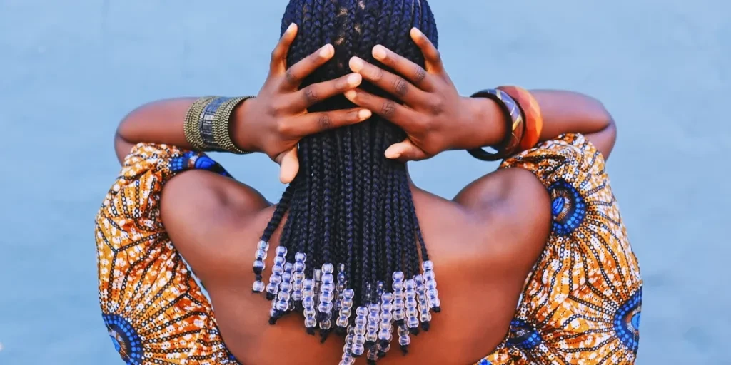 Woman showcasing her Fulani braids
