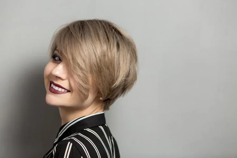 Woman with Short Blonde Stacked Bob Hairstyle
