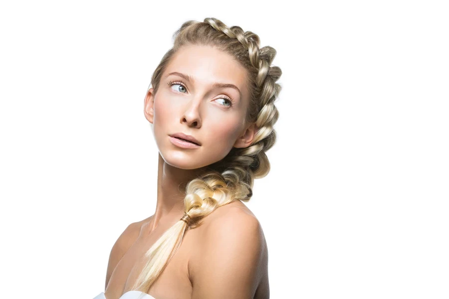 Woman with blond hair and stylish French braid hairstyle