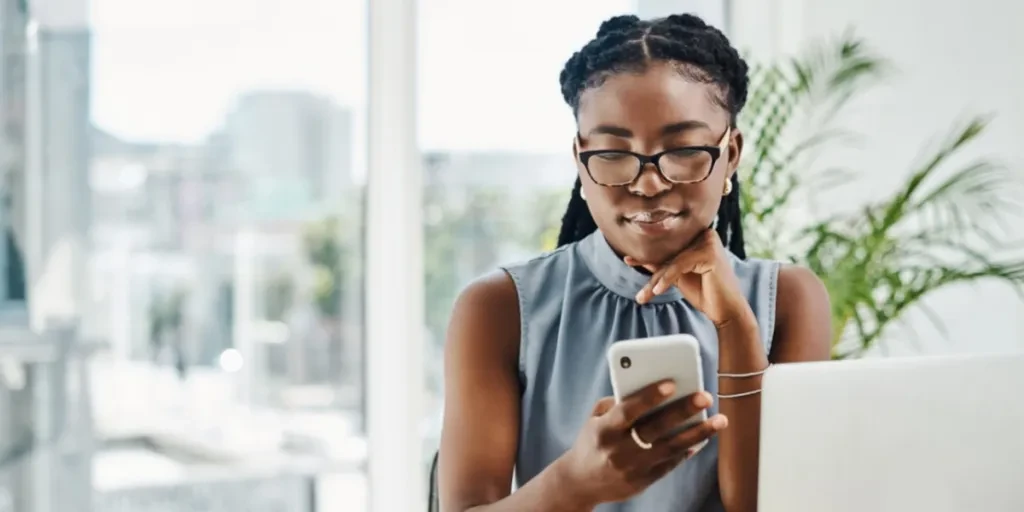 Woman with invisible locs at work