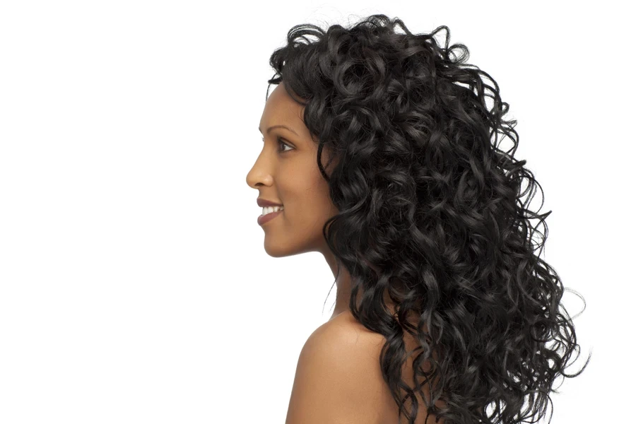 Woman with voluminous black curls