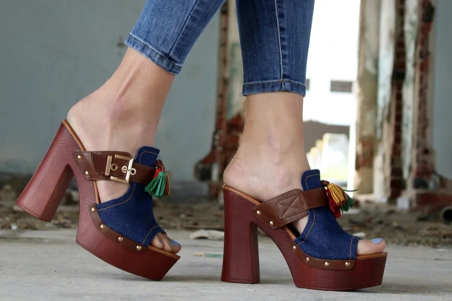 Wooden sole platform mule clogs with western-inspired design