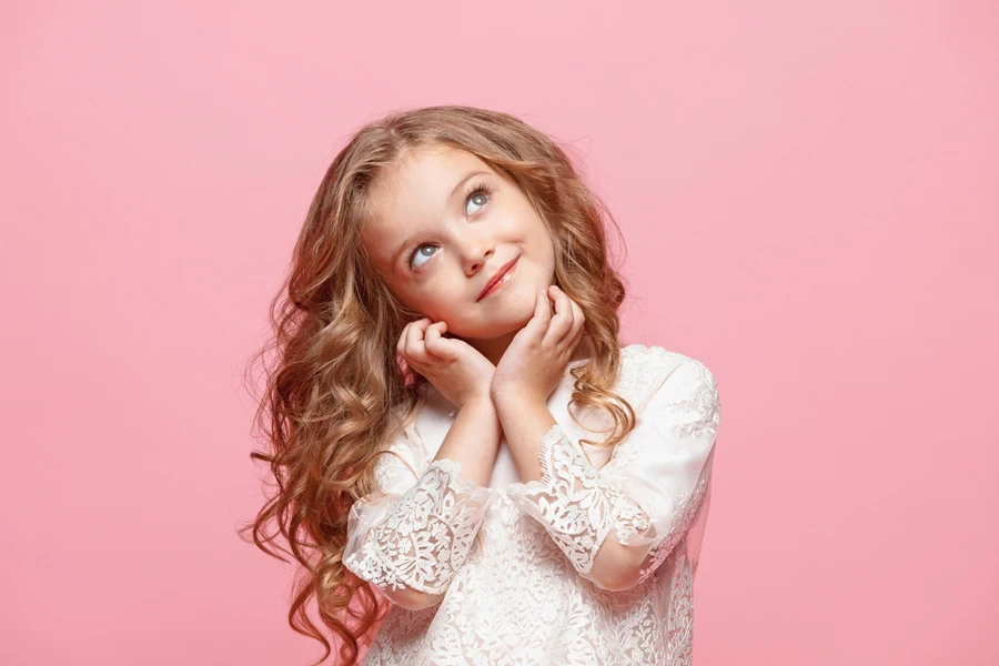 Young girl with long wavy light brown hair