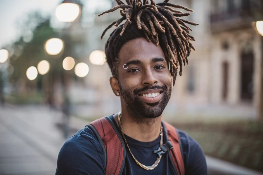 Young man showcasing his dreadlocks