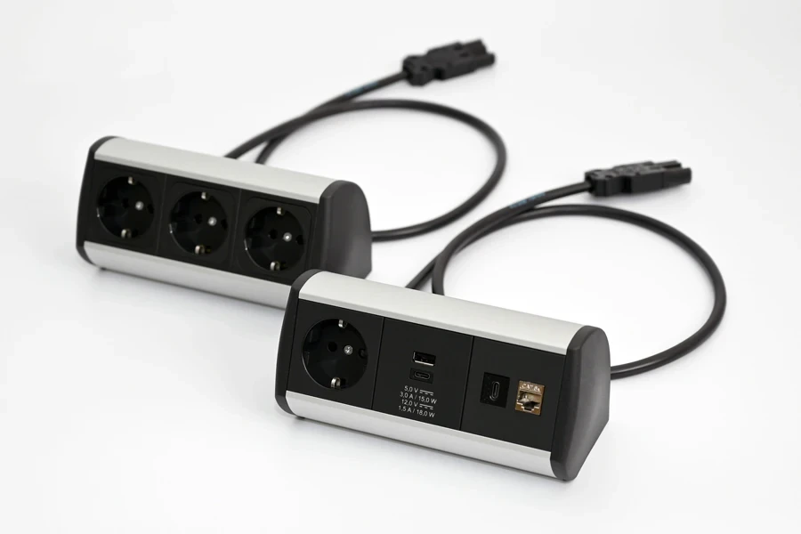 a couple of black and white electrical outlets