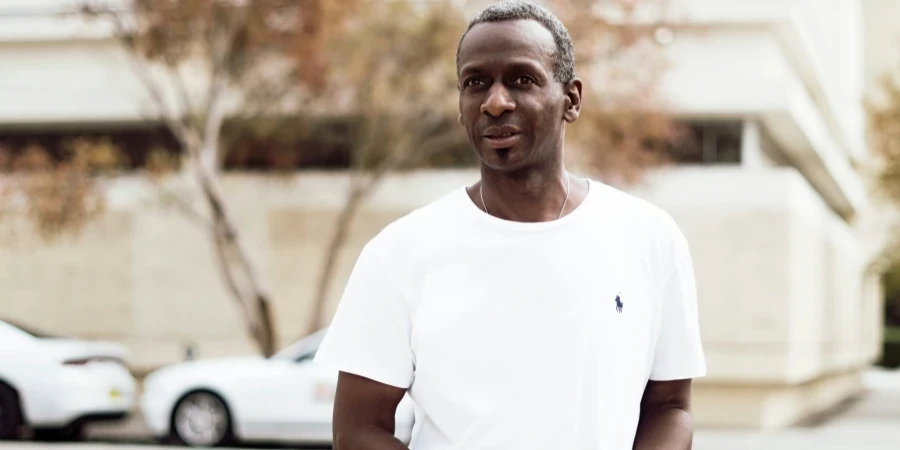man standing on street