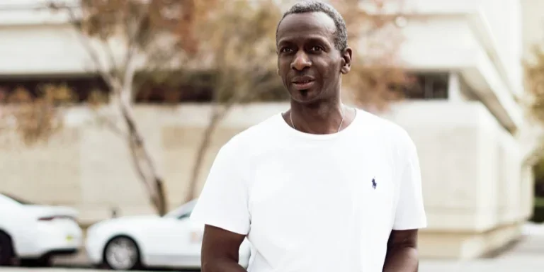 man standing on street