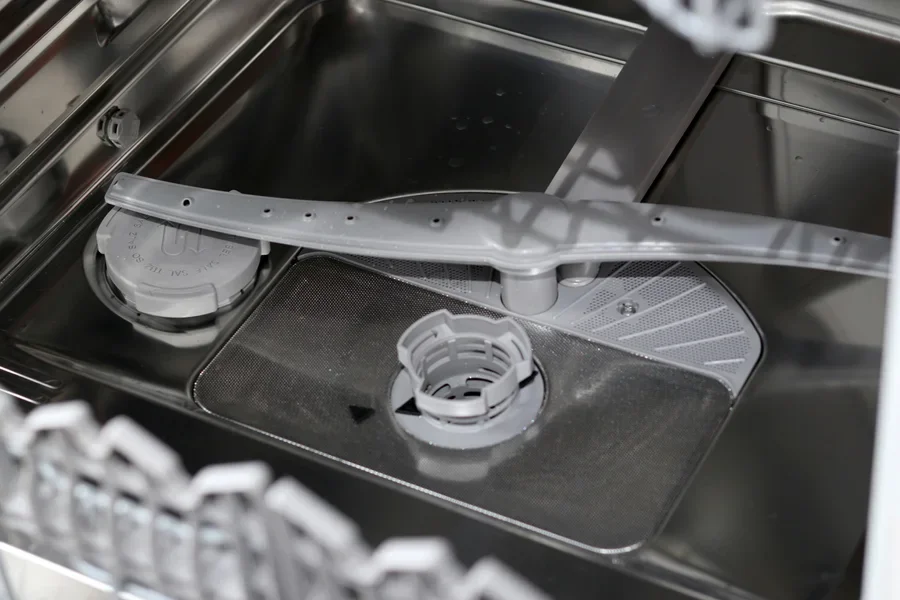 A filter installed in a modern dishwasher