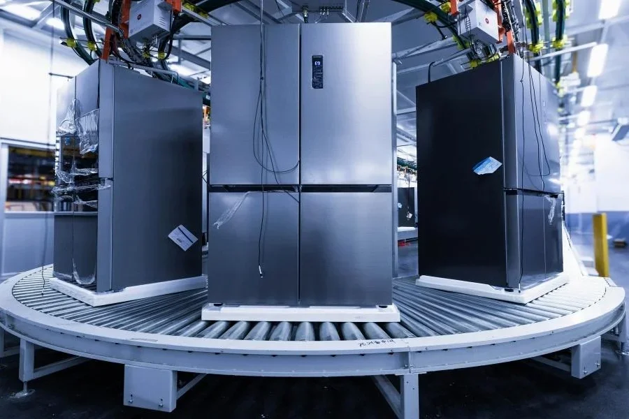 A group of fridges on display