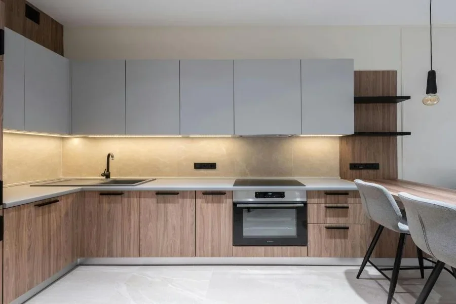 A kitchen with under cabinet lightin