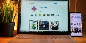 An Instagram page on laptop and mobile