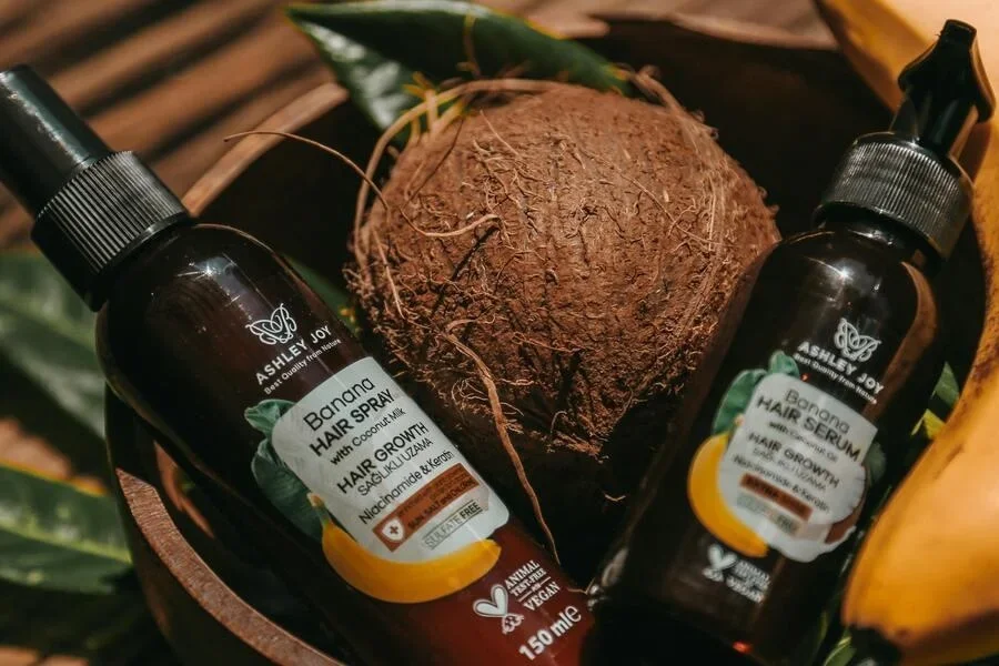 Hair serum and spray in bottles