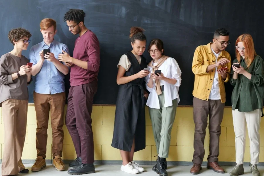 Photo Of People Standing Near Chalk Board