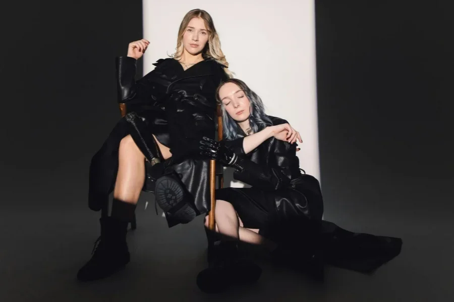 Photo Of Woman Leaning On Wooden Chair