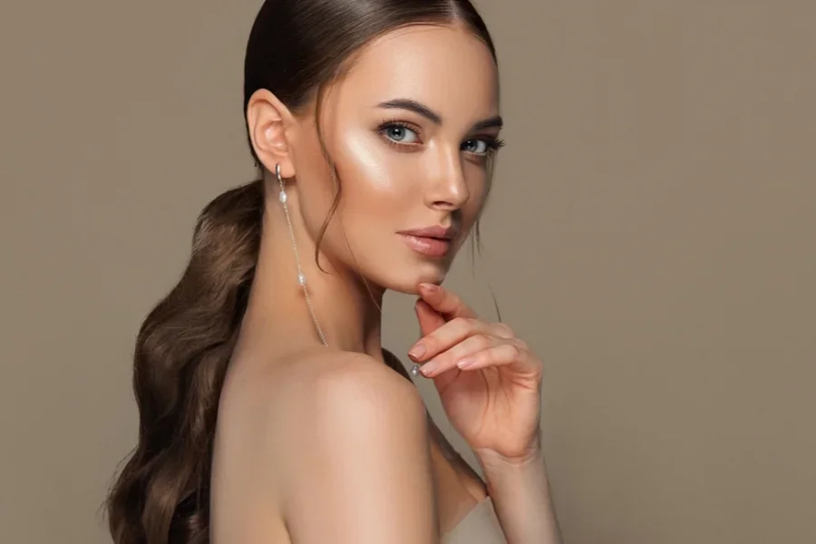 Stylish woman wearing elegant chic earrings