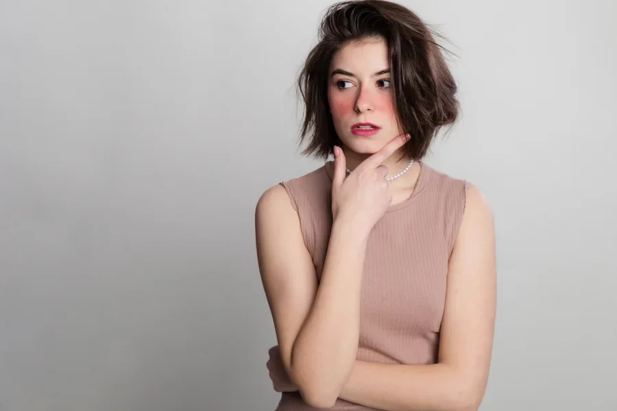 Casual woman face expressions she does not go to spa, hair salon or beauty salon for long time.