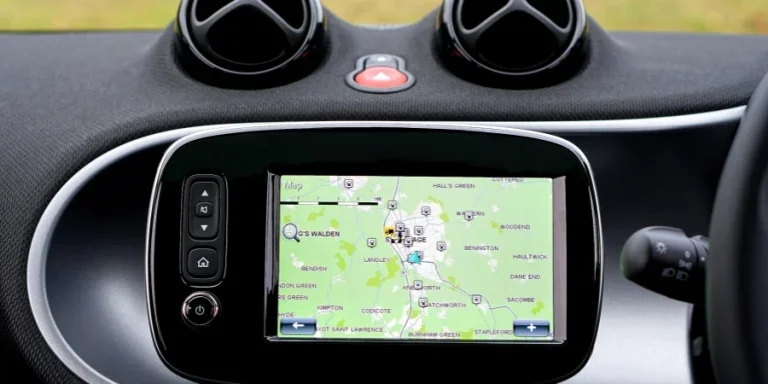 Close-up view of a modern car dashboard featuring a GPS map for navigation