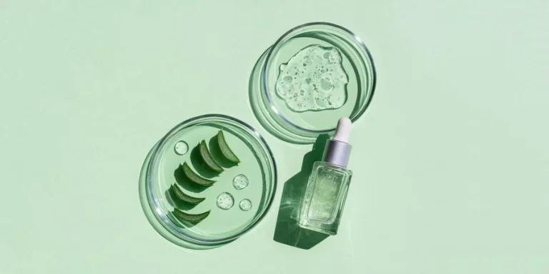 Flat Lay of Cosmetics Serum and Laboratory Glassware