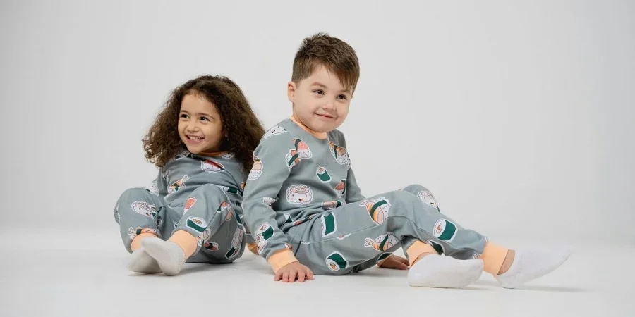 Siblings Sitting in Overalls