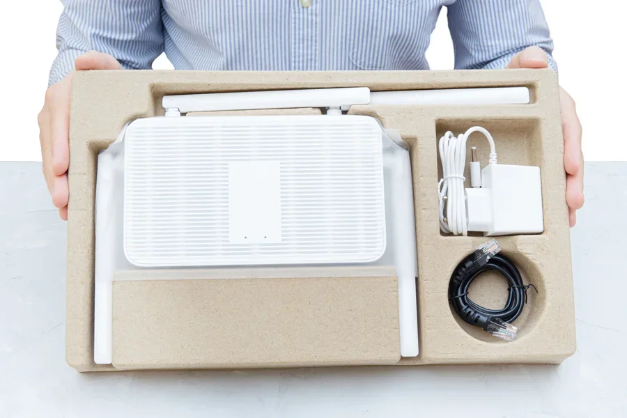Unboxing a new router for a mesh Wi-Fi system