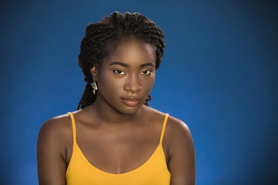 Woman Looks At Camera Sadly