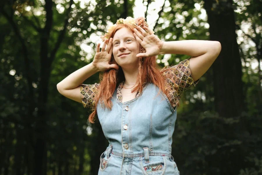 Woman in Blue Denim Jumper Smiling